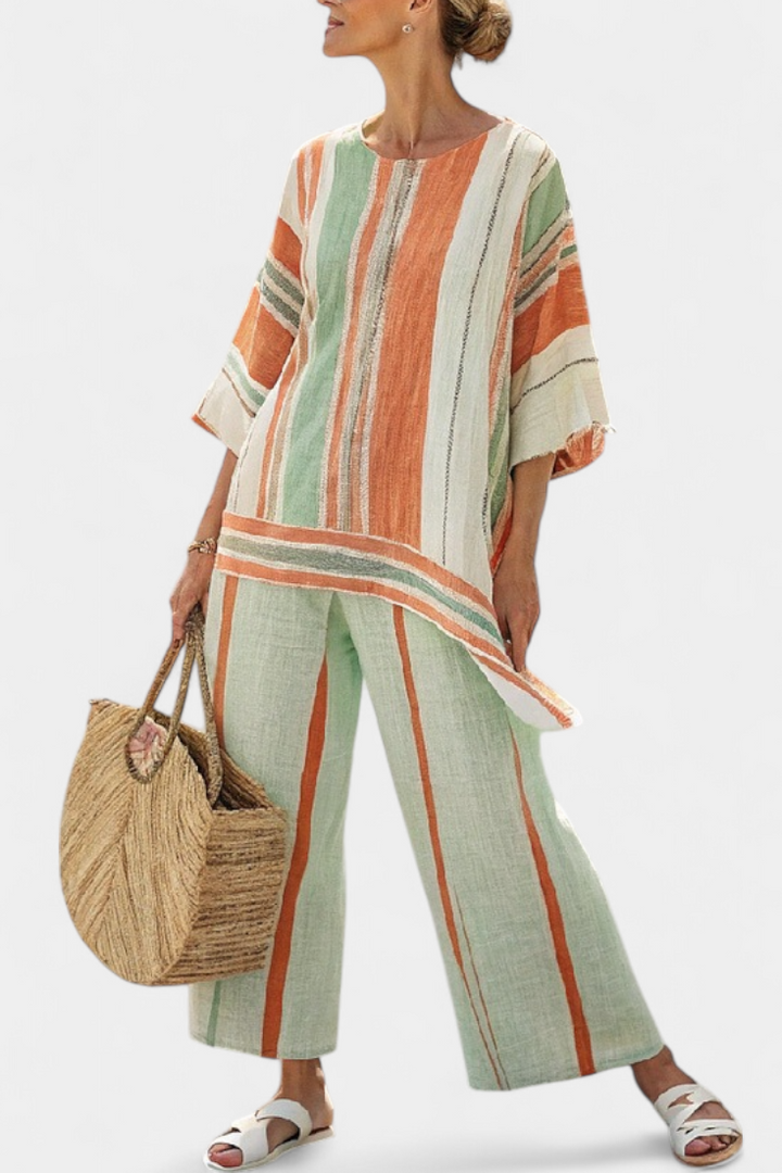 Elisabetta – top asimmetrico elegante e pantaloni a gamba larga